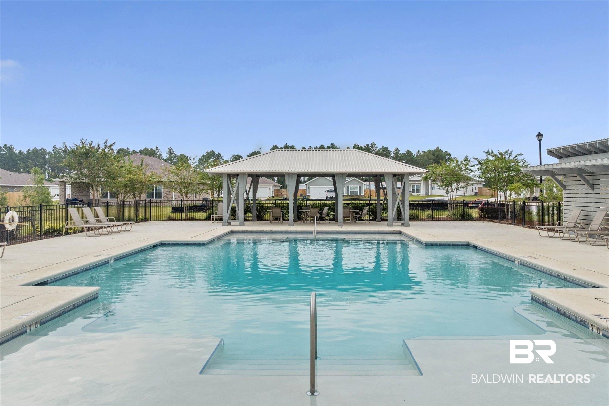 1105 Hayward Loop Foley, AL 36535 - Photo 28 of 30 Community pool with a patio