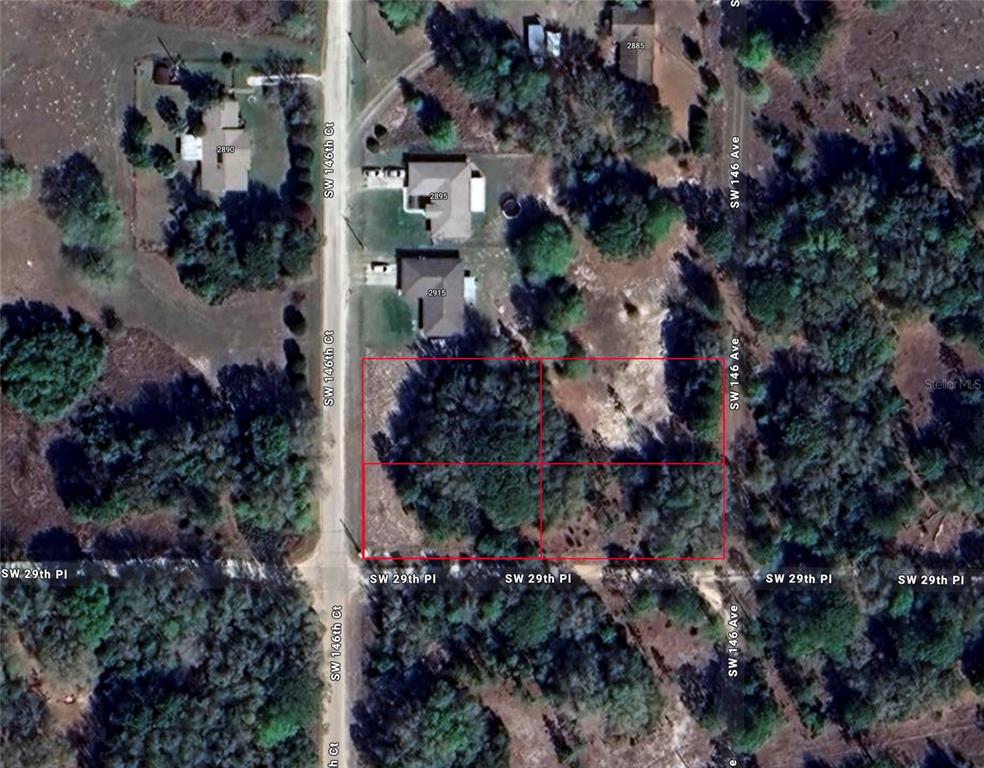 Southwest 146th Court Ocala, FL 34481 - Photo 7 of 11 an aerial view of residential house with outdoor space and covered by trees