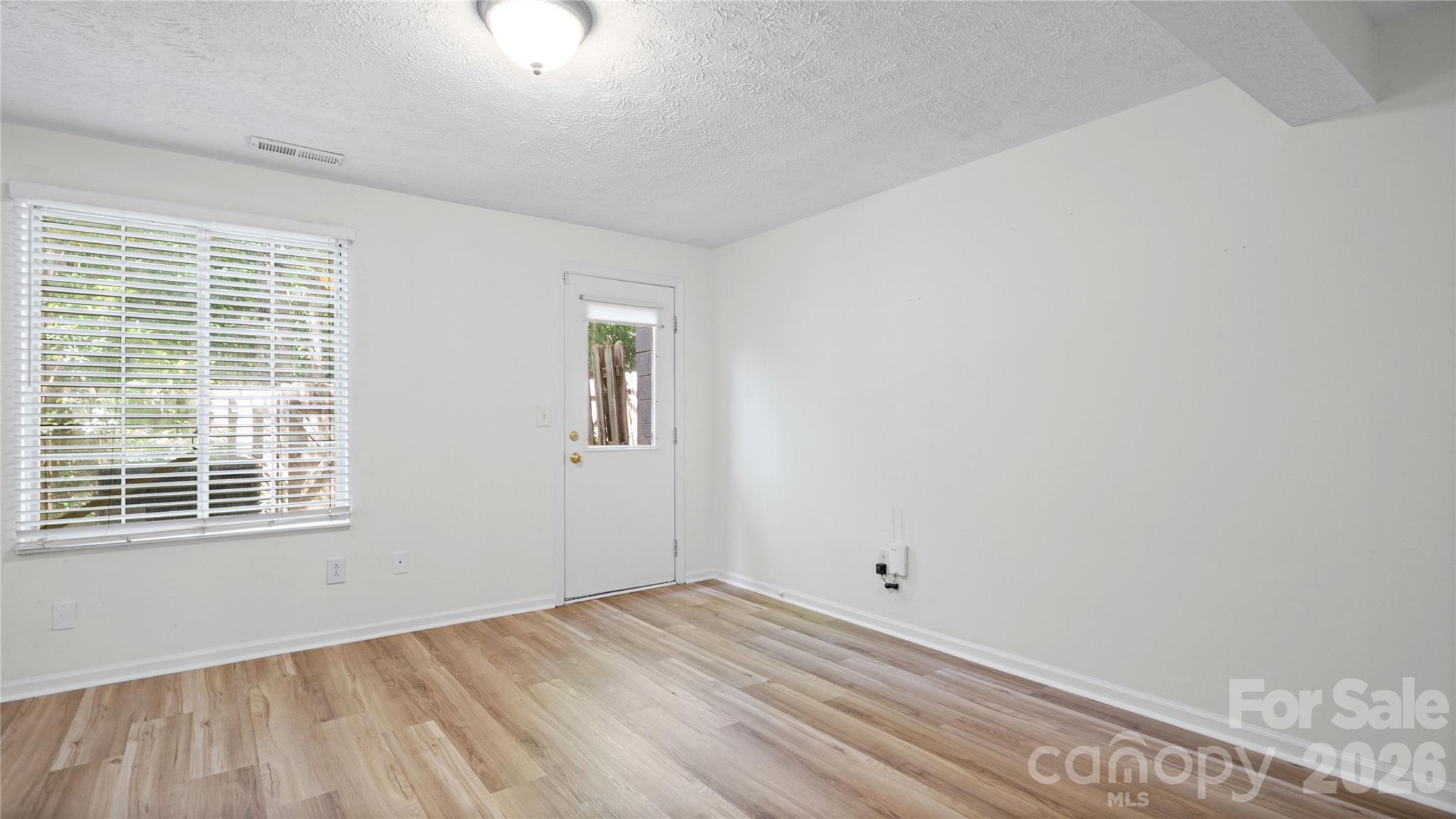 1231 Scaleybark Road Charlotte, NC 28209 - Photo 22 of 31 a view of a room that has a window in it