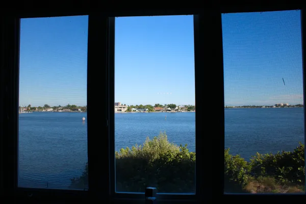a view of a lake from a balcony