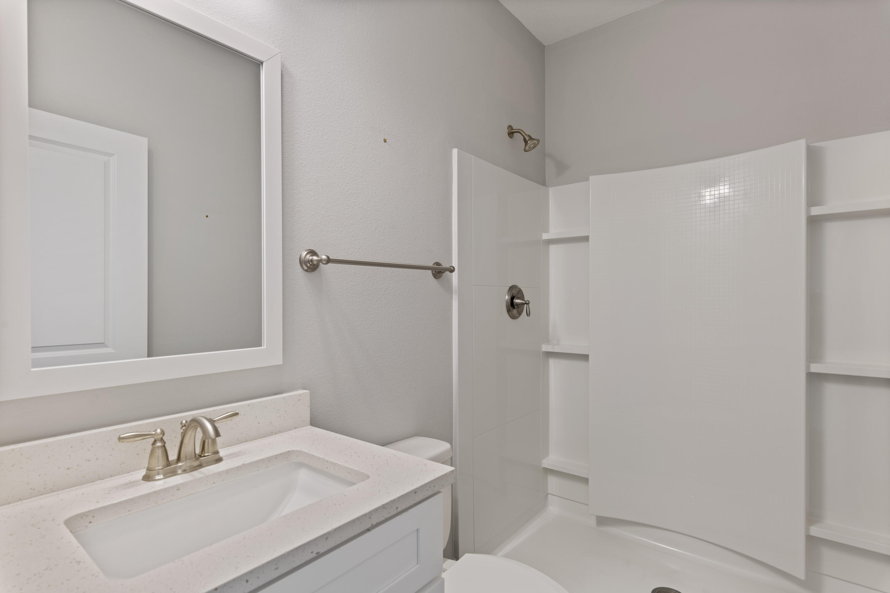 296 North Sand Palm Road Freeport, FL 32439 - Photo 25 of 30 a bathroom with a sink toilet and shower