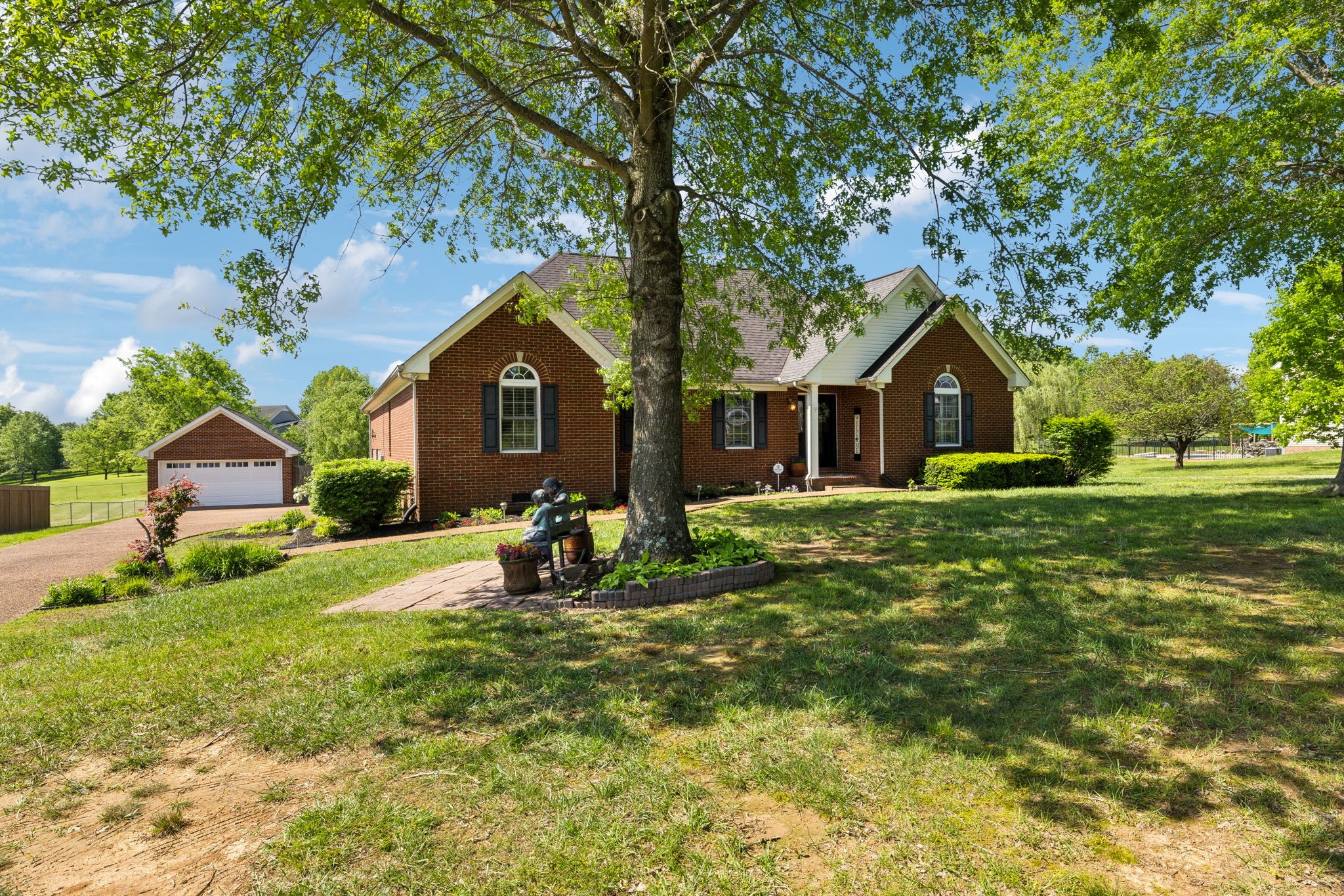 2508 Pleasant View Road Pleasant View, TN 37146 - Photo 1 of 56 a front view of a house with yard and green space