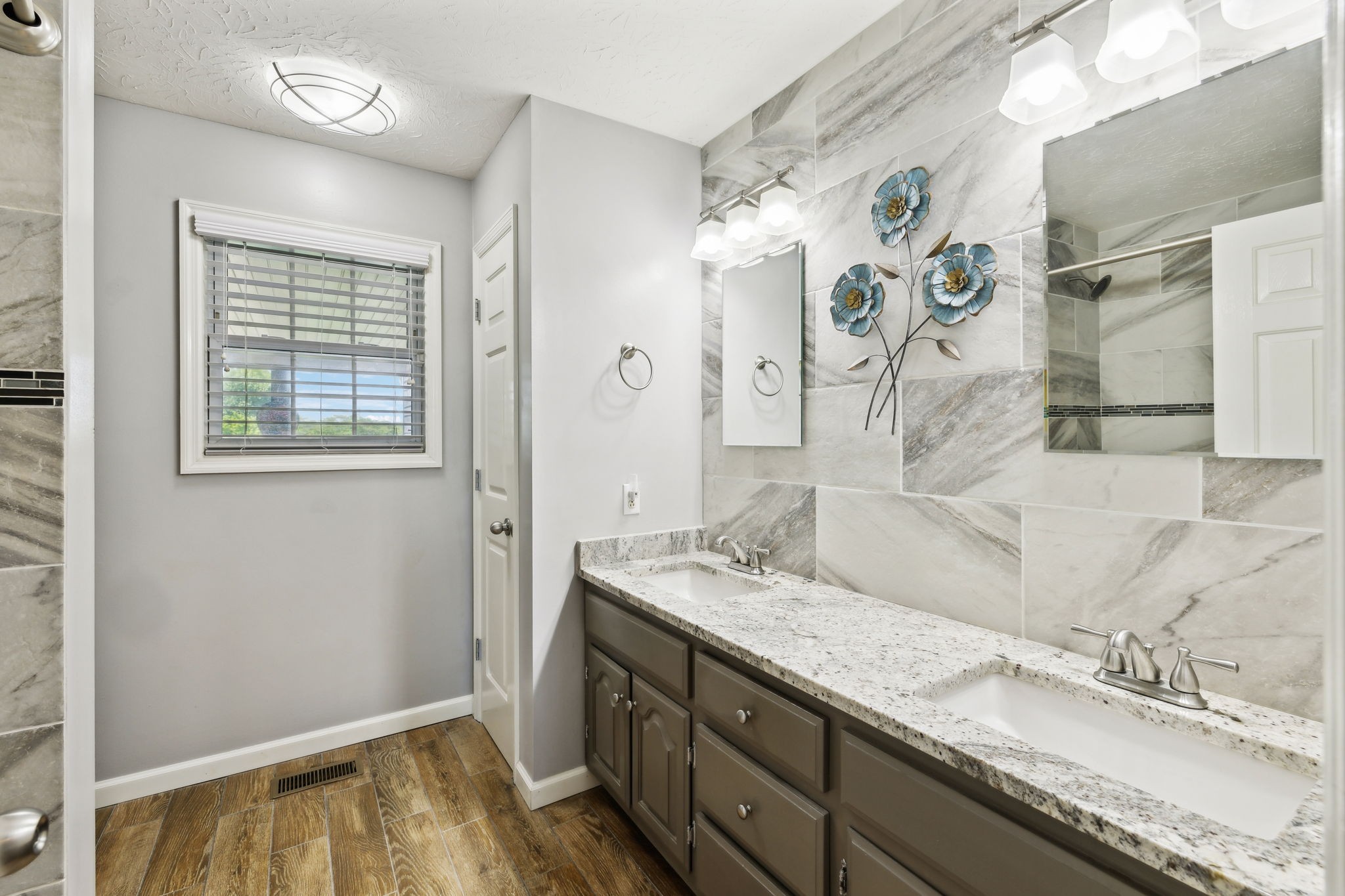 2508 Pleasant View Road Pleasant View, TN 37146 - Photo 29 of 56 a bathroom with a granite countertop sink and a mirror
