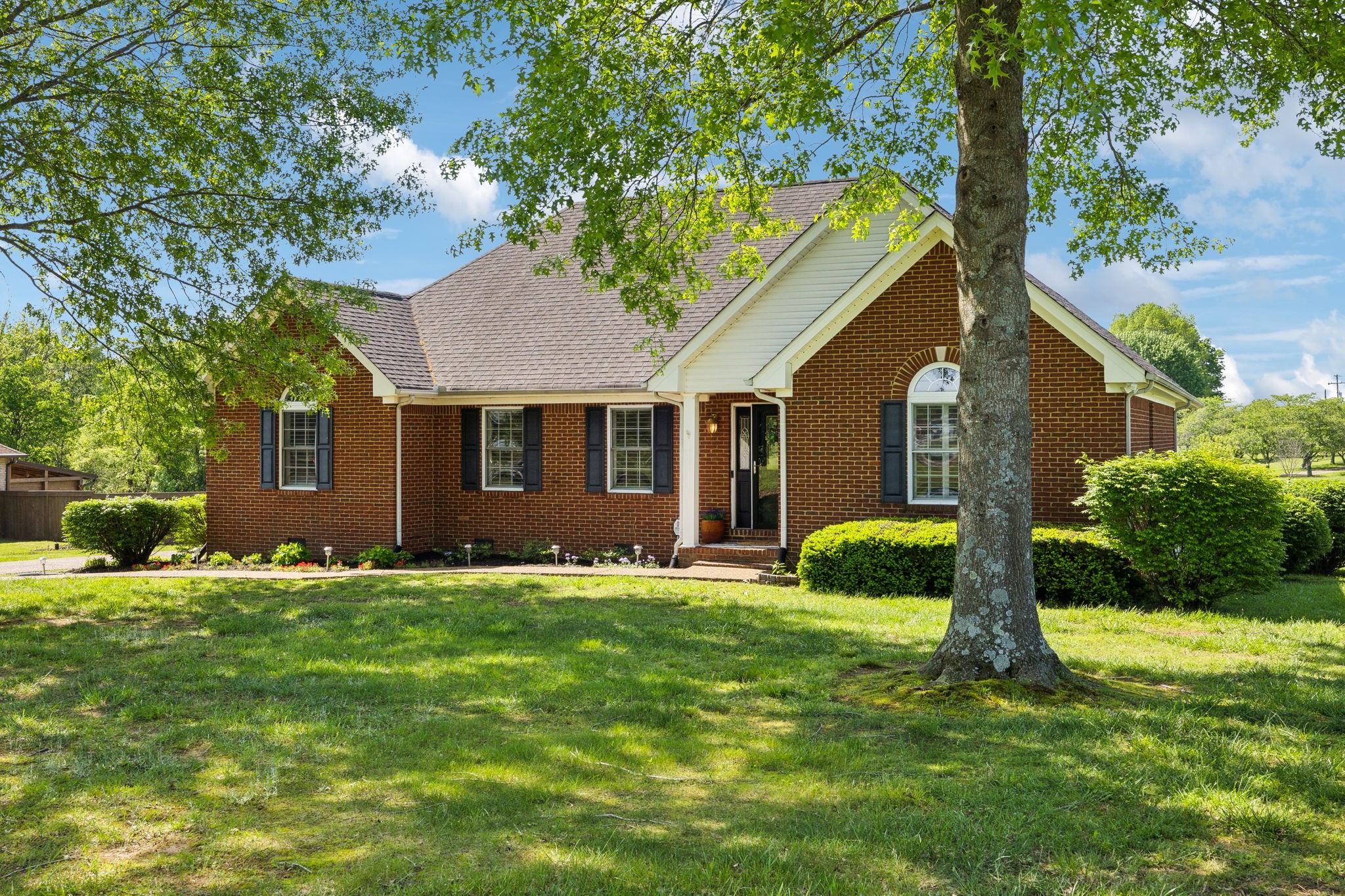2508 Pleasant View Road Pleasant View, TN 37146 - Photo 4 of 56 a front view of a house with a yard and trees