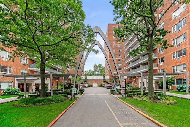 a view of a building with a yard