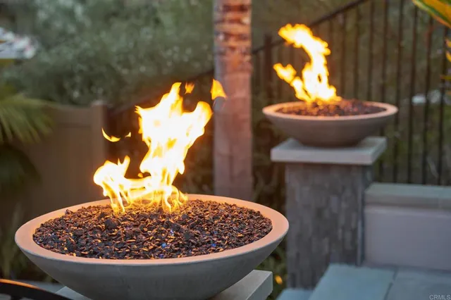 a vase of flowers sitting on a table