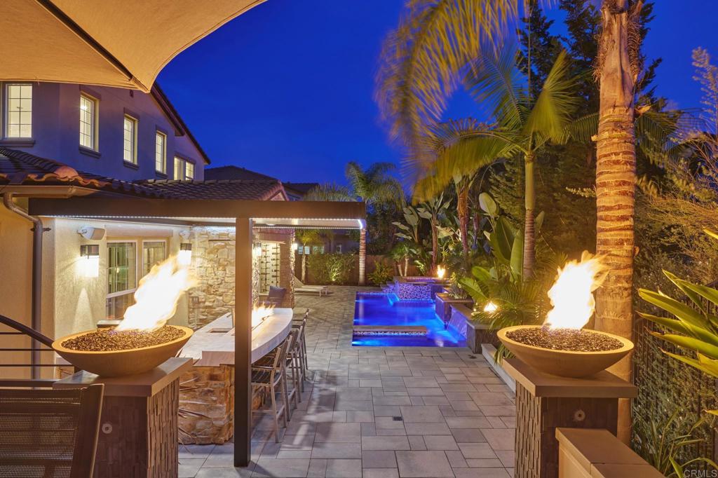 3615 Corte Claro Carlsbad, CA 92009 - Photo 17 of 49 a view of a chairs and table in the patio