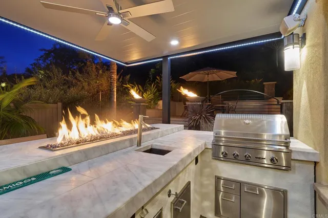 a kitchen with a stove and a microwave