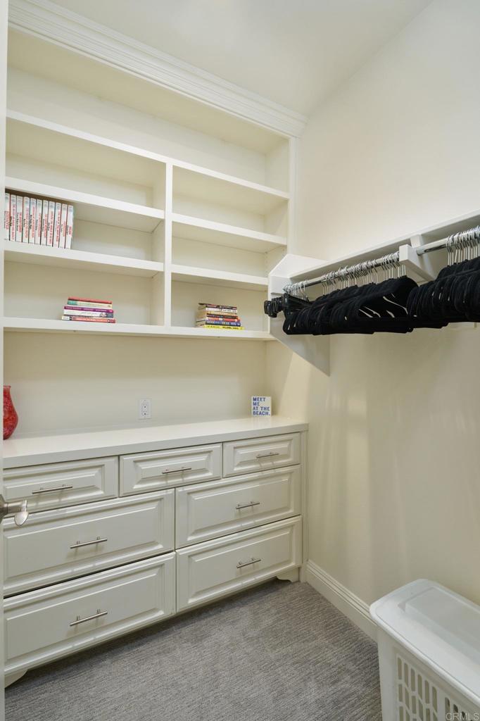 3615 Corte Claro Carlsbad, CA 92009 - Photo 46 of 49 a view of walk in closet with empty racks