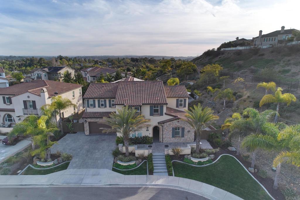 3615 Corte Claro Carlsbad, CA 92009 - Photo 5 of 49 a view of a house with a garden