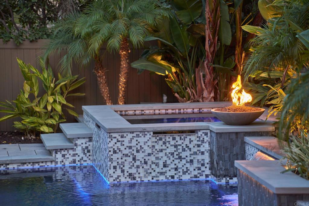 3615 Corte Claro Carlsbad, CA 92009 - Photo 9 of 49 a front view of a house with a yard