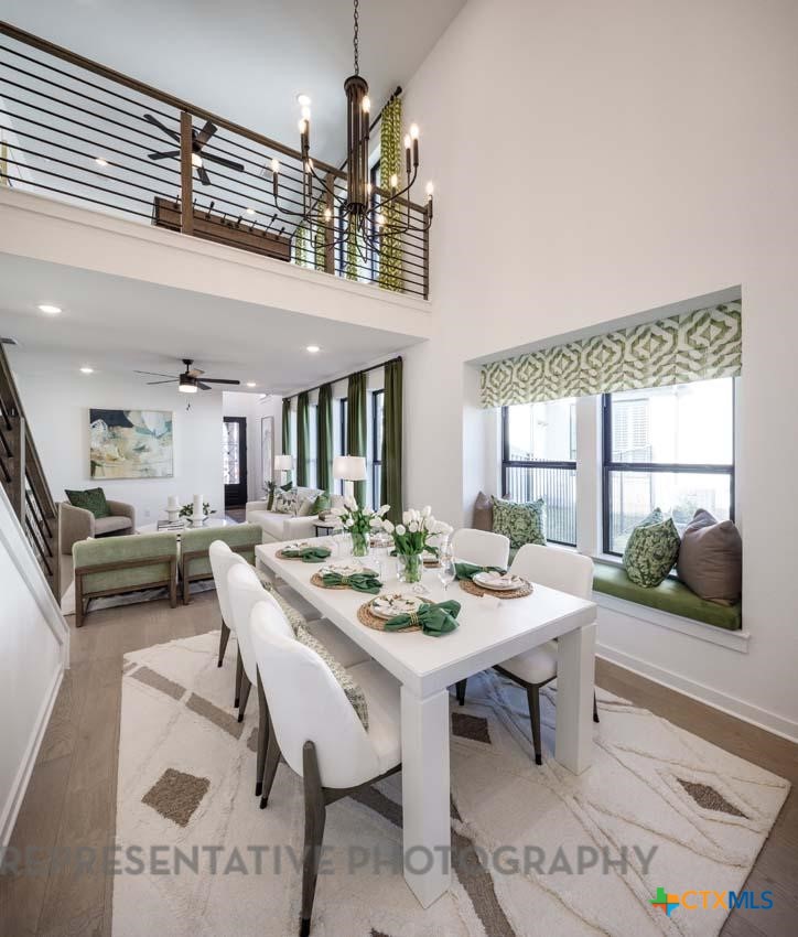 133 Three Oaks Lane Georgetown, TX 78628 - Photo 22 of 40 a view of a dining room with furniture window and outside view