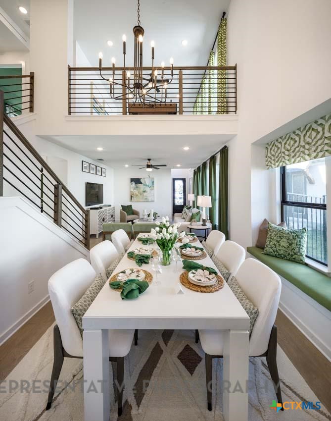 133 Three Oaks Lane Georgetown, TX 78628 - Photo 23 of 40 a view of a dining room with furniture