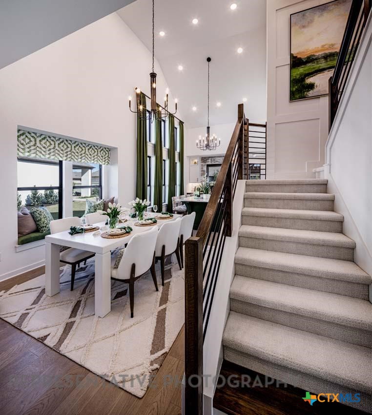 133 Three Oaks Lane Georgetown, TX 78628 - Photo 24 of 40 a view of a dining room with furniture