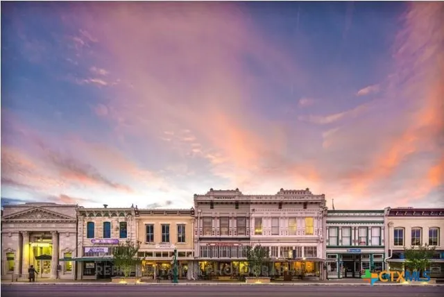 a view of a house with swimming pool
