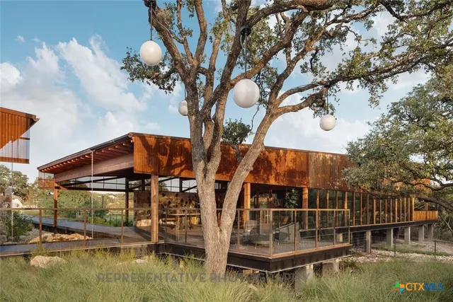 a view of a balcony with an ocean view