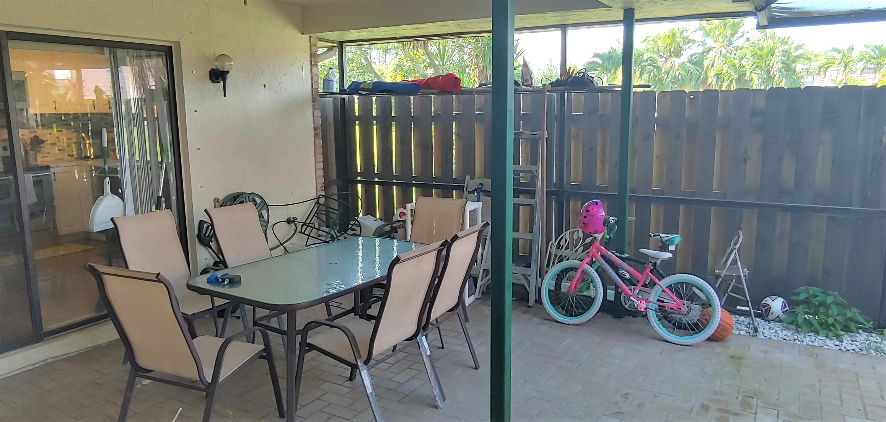 7641 Courtyard Run West Boca Raton, FL 33433 - Photo 11 of 14 Covered patio
