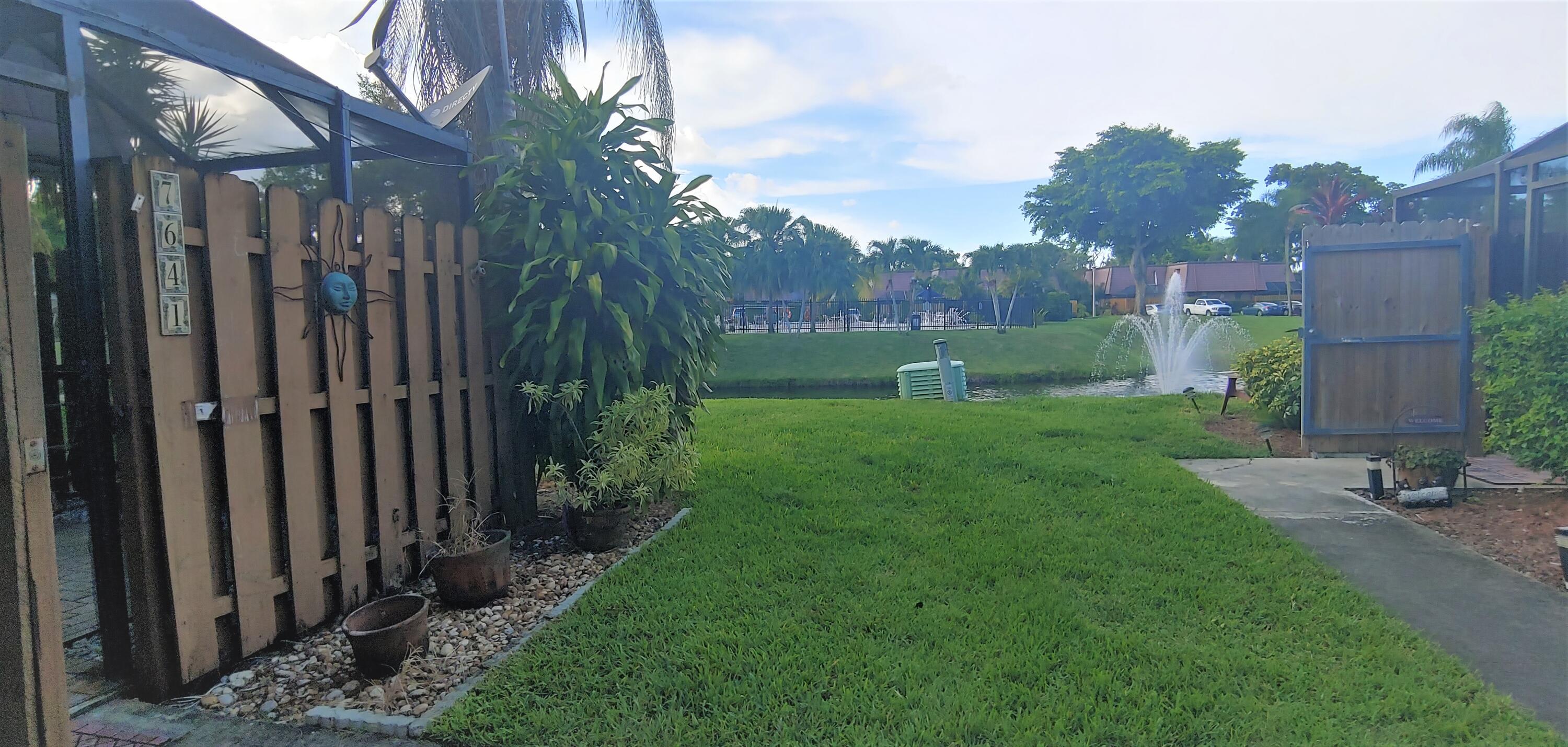 7641 Courtyard Run West Boca Raton, FL 33433 - Photo 13 of 14 Side view