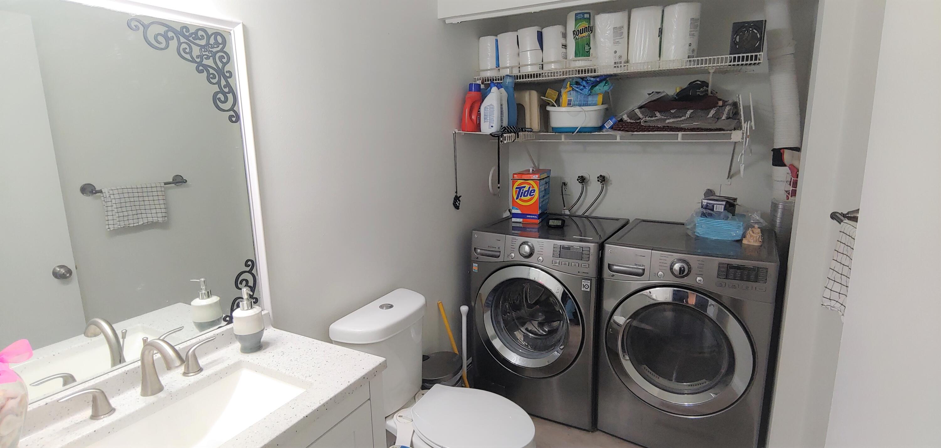 7641 Courtyard Run West Boca Raton, FL 33433 - Photo 6 of 14 Guest bathroom with laundry