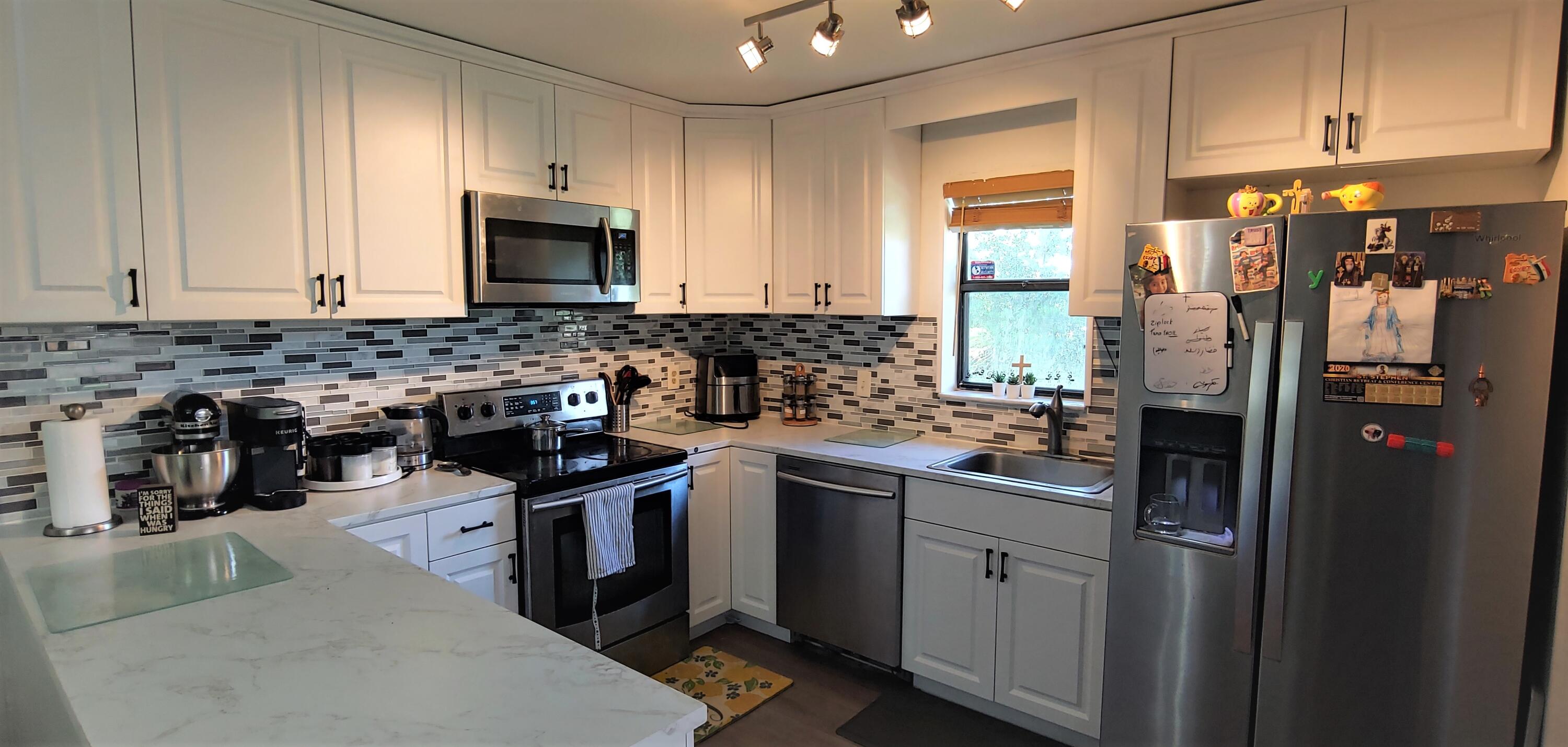 7641 Courtyard Run West Boca Raton, FL 33433 - Photo 7 of 14 Kitchen view 1