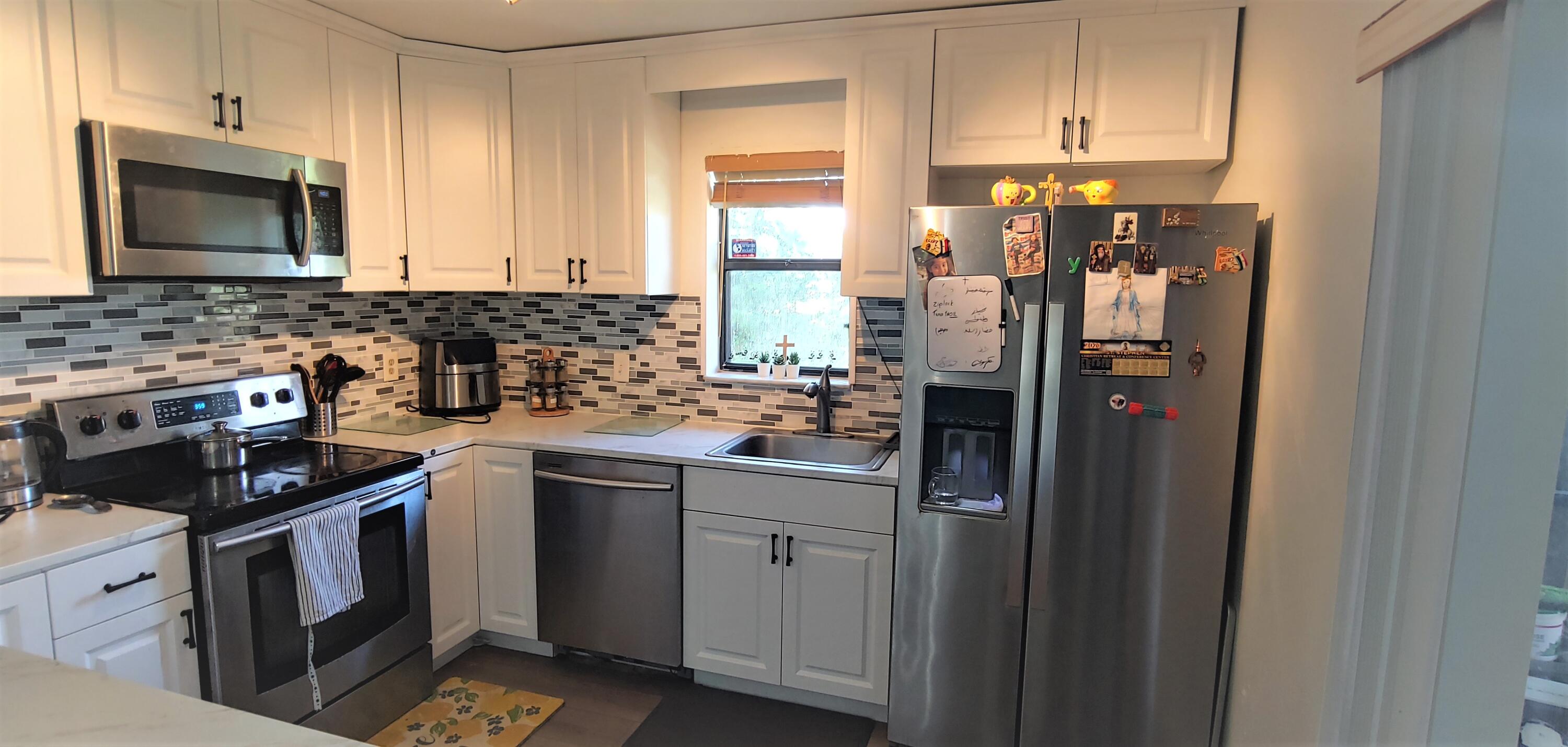 7641 Courtyard Run West Boca Raton, FL 33433 - Photo 8 of 14 Kitchen view 2