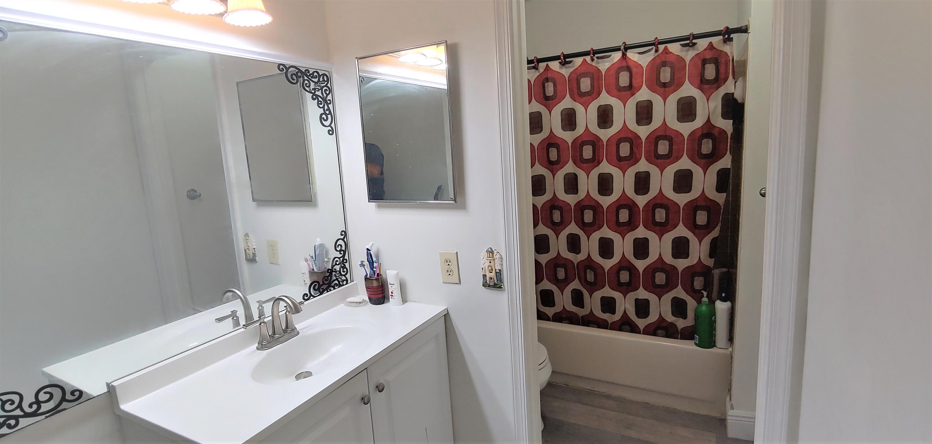 7641 Courtyard Run West Boca Raton, FL 33433 - Photo 9 of 14 Gueest bathroom 2