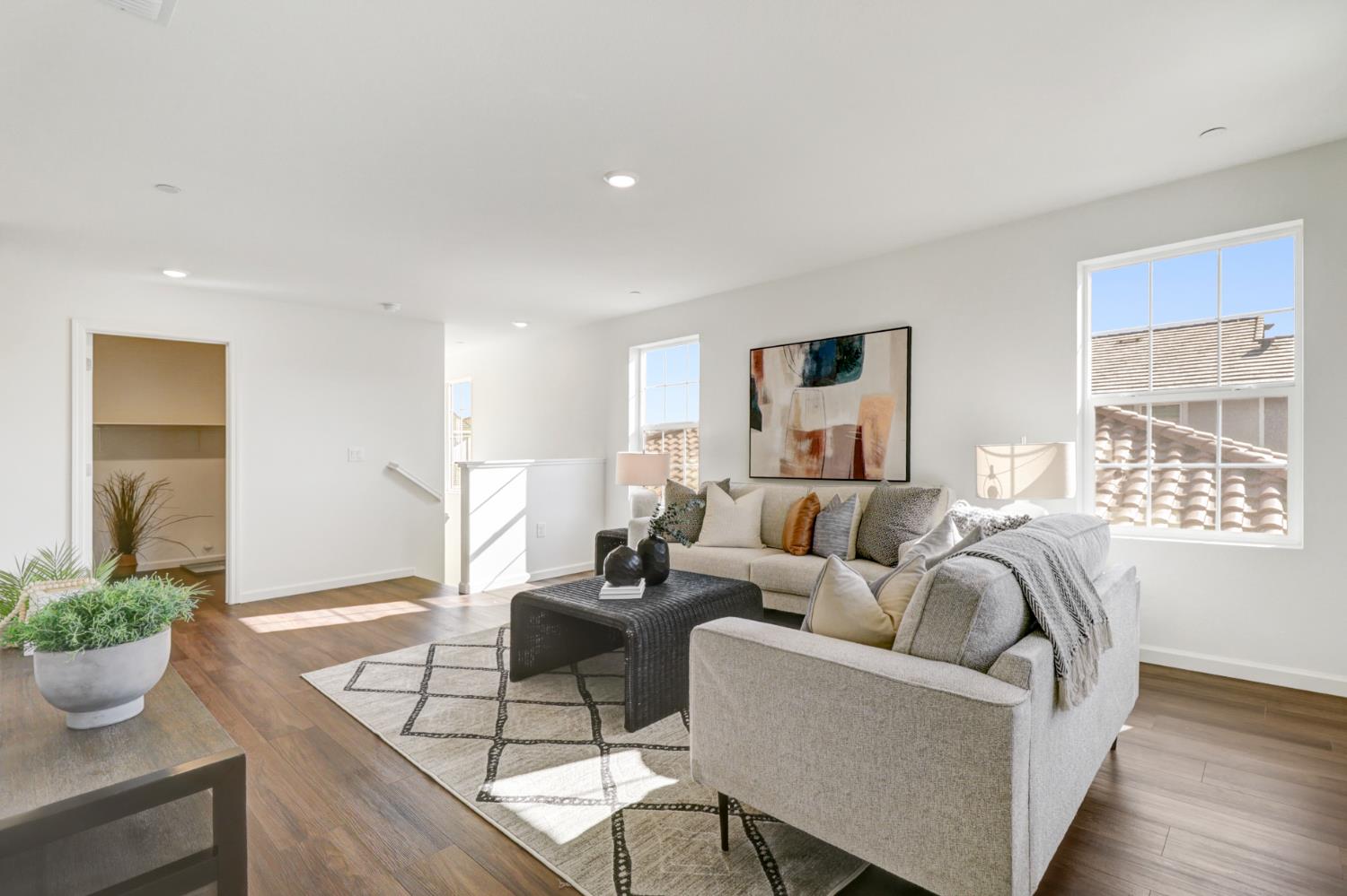 10167 Ramy Circle Elk Grove, CA 95757 - Photo 24 of 50 a living room with furniture potted plant and window