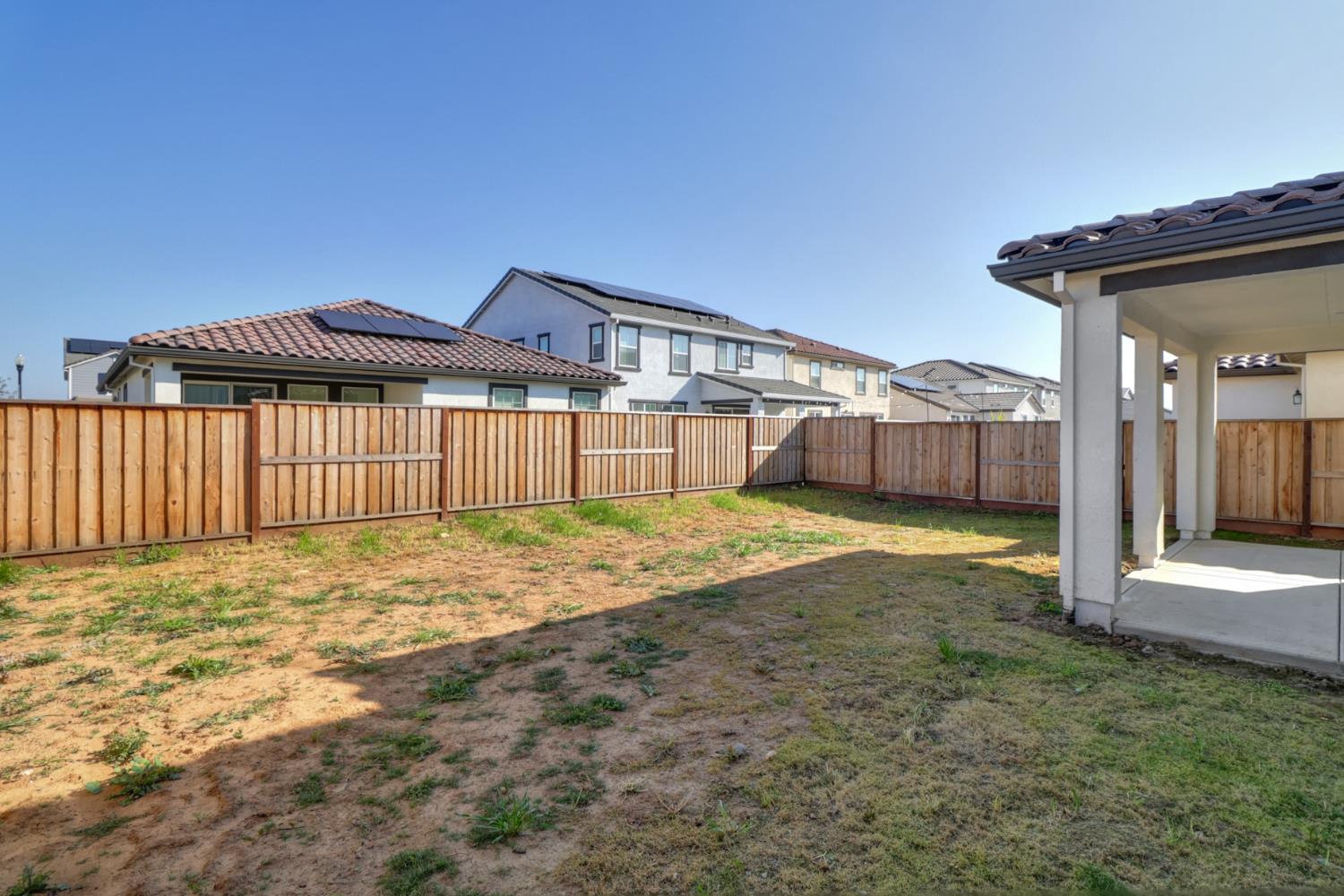 10167 Ramy Circle Elk Grove, CA 95757 - Photo 47 of 50 a front view of a house with a yard
