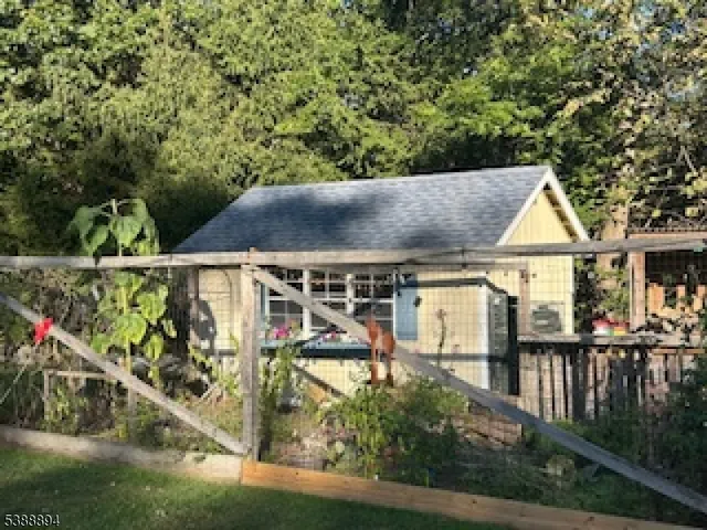 an outdoor view of house and swimming pool