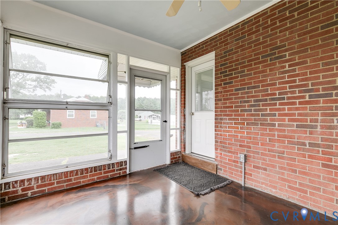 12365 Ashcake Road Ashland, VA 23005 - Photo 4 of 80 Enclosed porch featuring exposed brick walls, mult