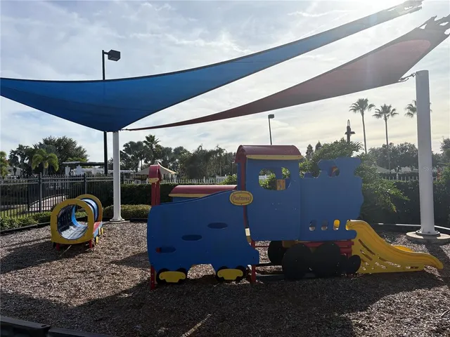 a view of swimming pool with a patio