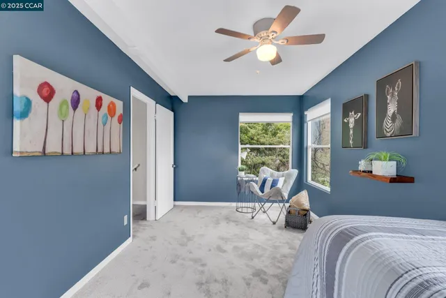 a bed room with a bed and a book shelf