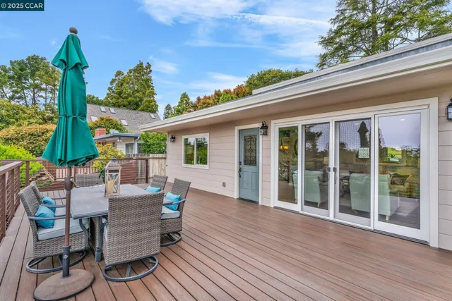 swimming pool view with a seating space