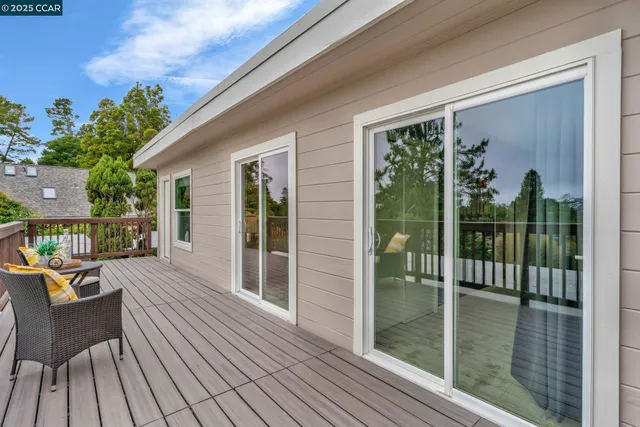 a view of balcony with furniture