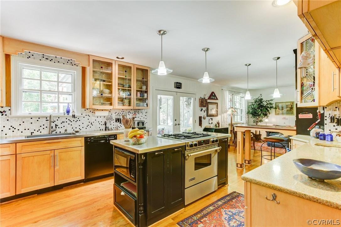 8802 Sierra Road Henrico, VA 23229 - Photo 25 of 42 Kitchen with hardwood floors, center island with J