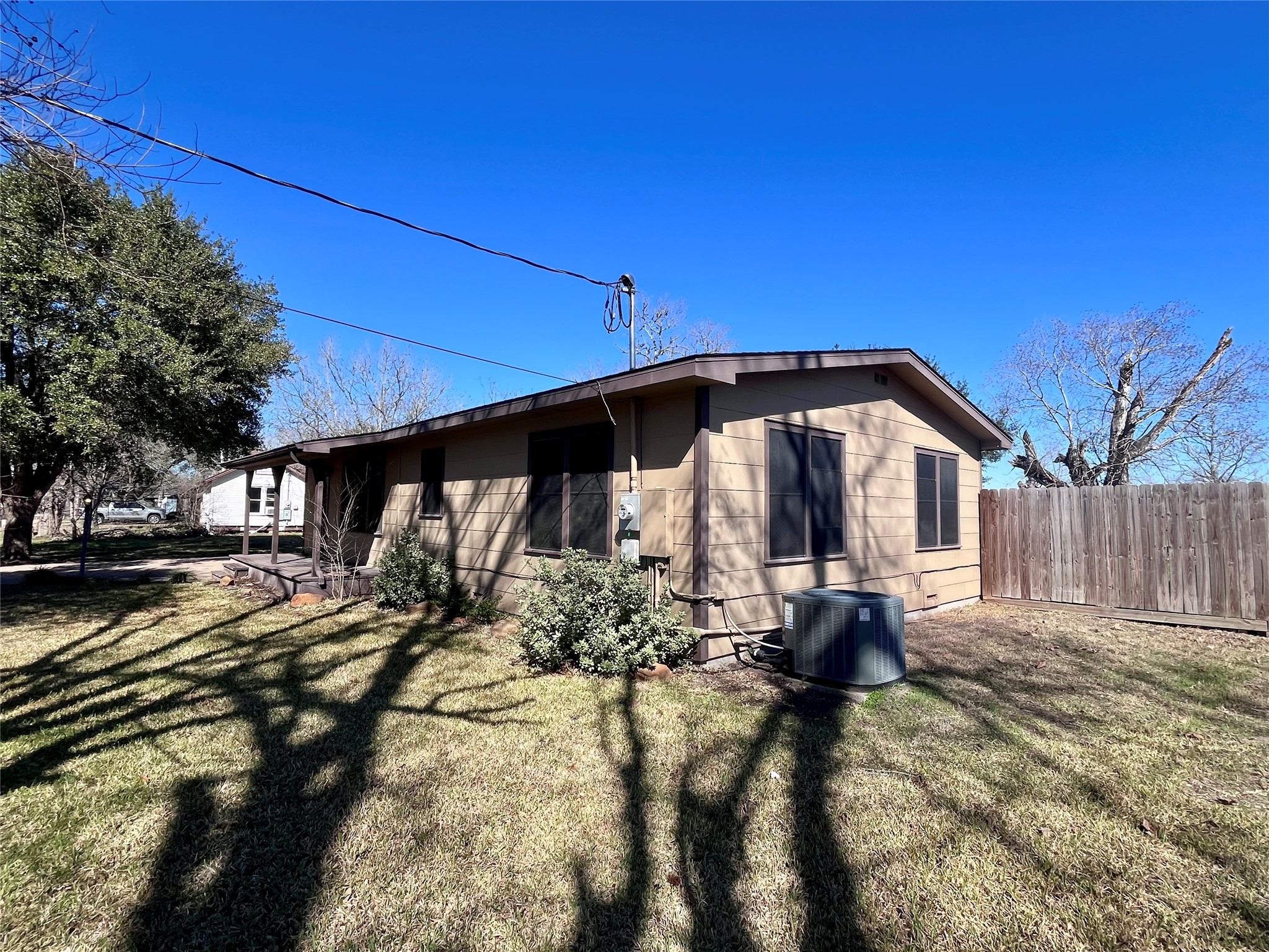1004 North Center Street Weimar, TX 78962 - Photo 11 of 15 a view of a house with a yard