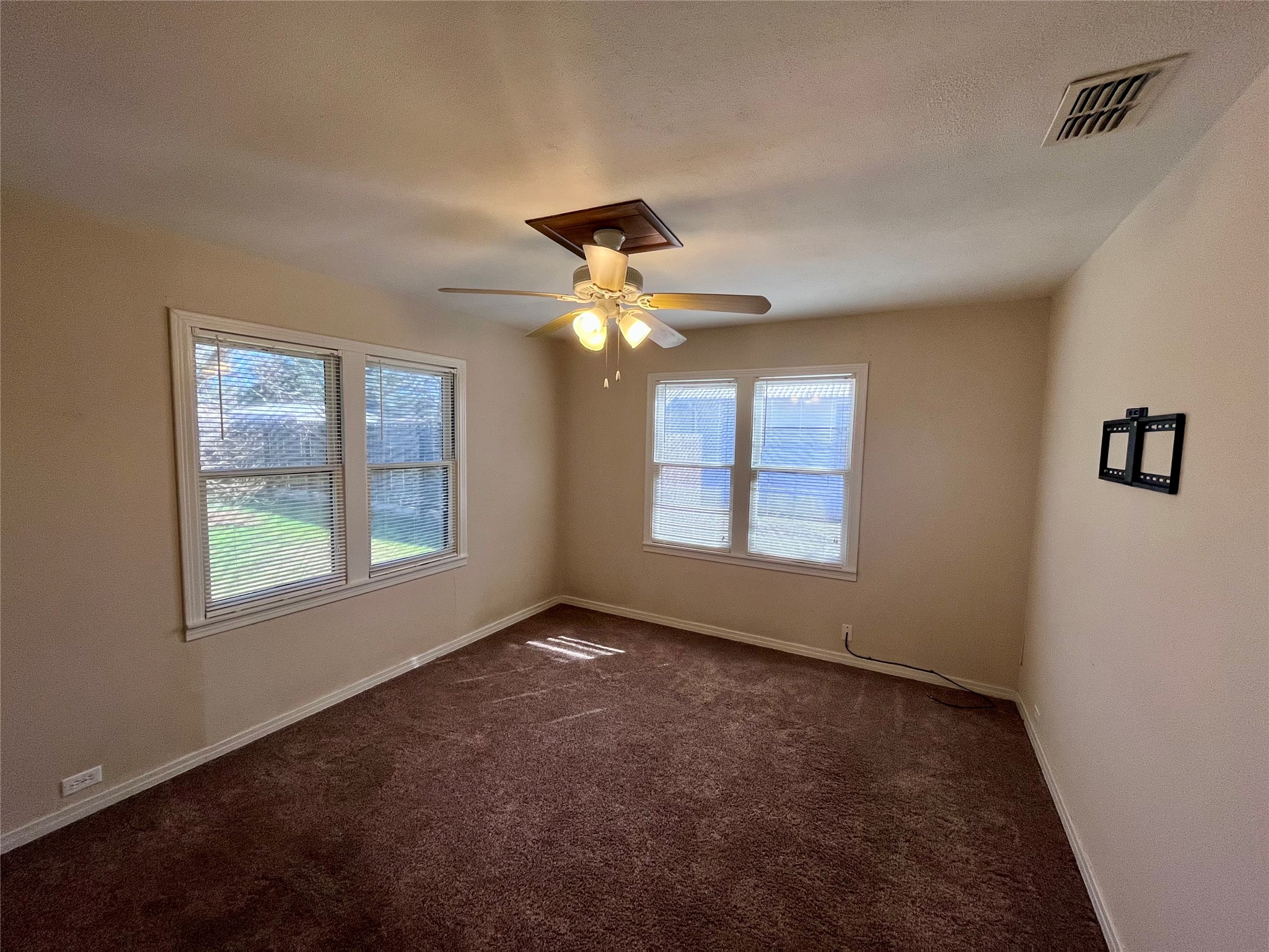 1004 North Center Street Weimar, TX 78962 - Photo 6 of 15 a view of an empty room with a window