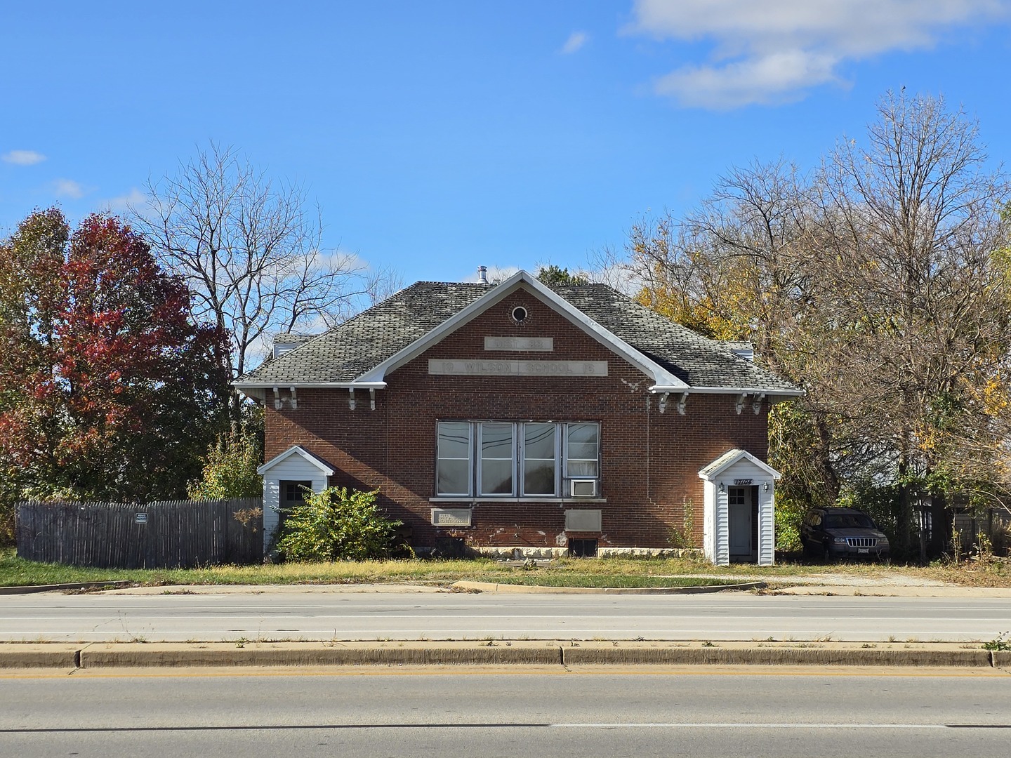 17104 Weber Road Lockport, IL 60441 - Photo 1 of 3 a view of a house with a yard and large tree