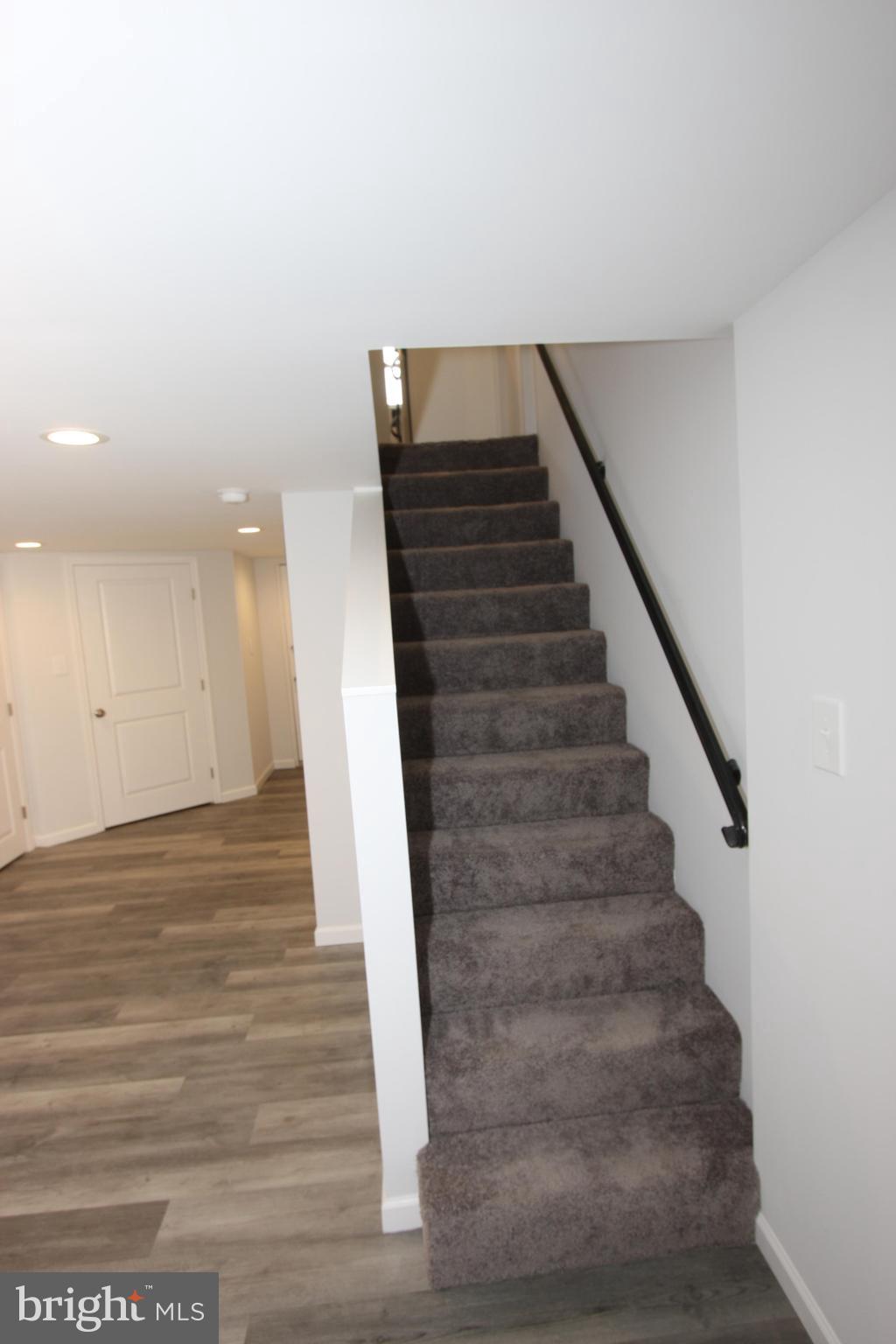 1920 Jasmine Road Baltimore, MD 21222 - Photo 26 of 40 Stairwell to basement with custom iron railing