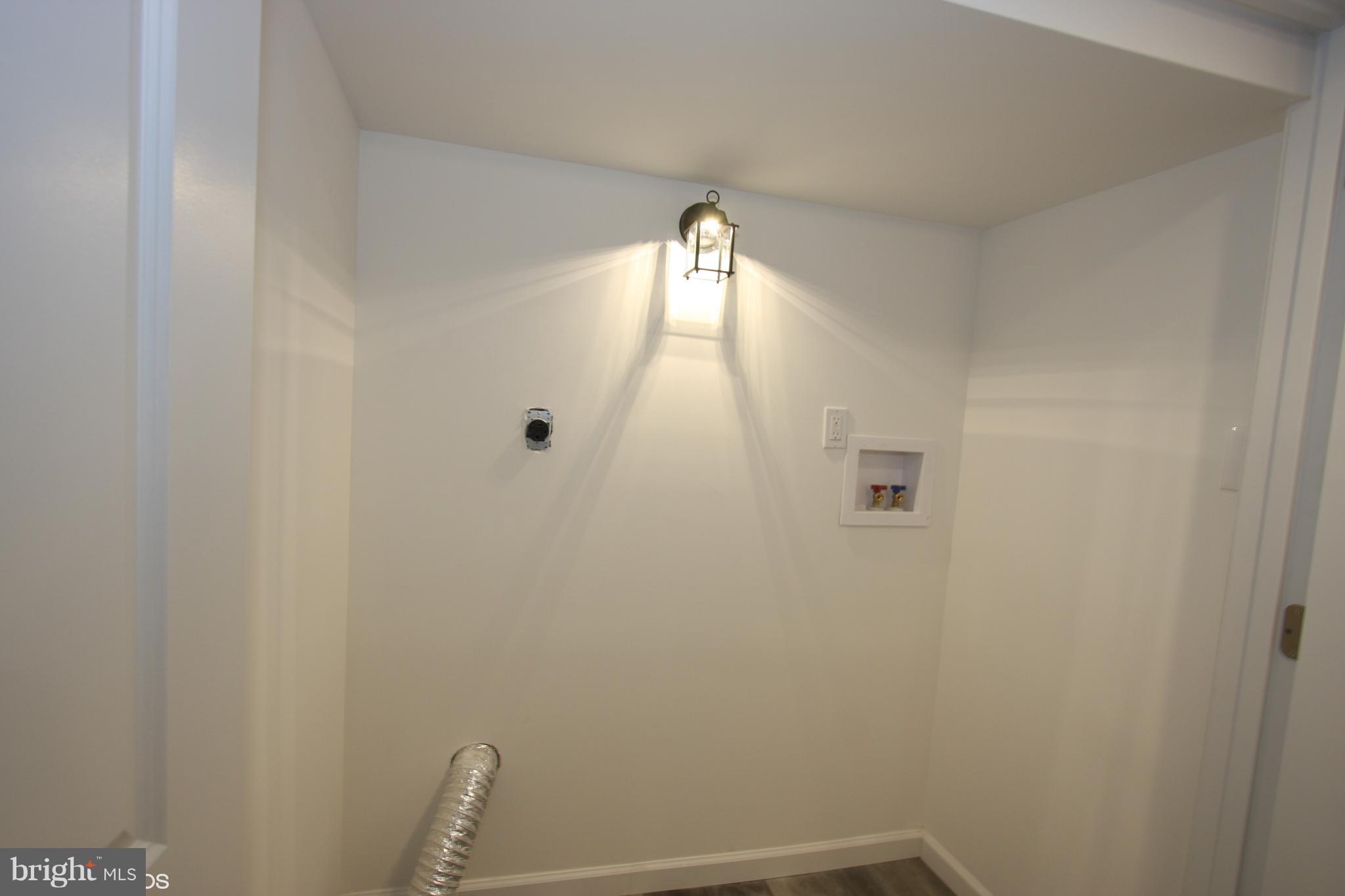 1920 Jasmine Road Baltimore, MD 21222 - Photo 29 of 40 Separate Laundry Closet, Finished w/ W/D Hook Up