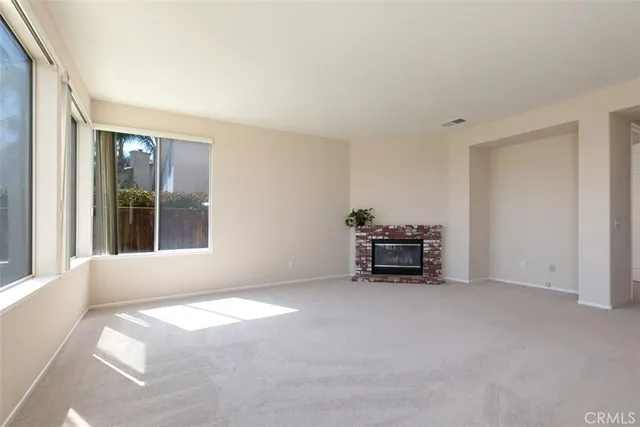 a room with furniture and a window