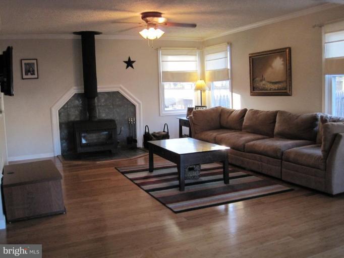 5868 Deale Churchton Road Deale, MD 20751 - Photo 21 of 28 Woodstove Conveys, Bamboo floors
