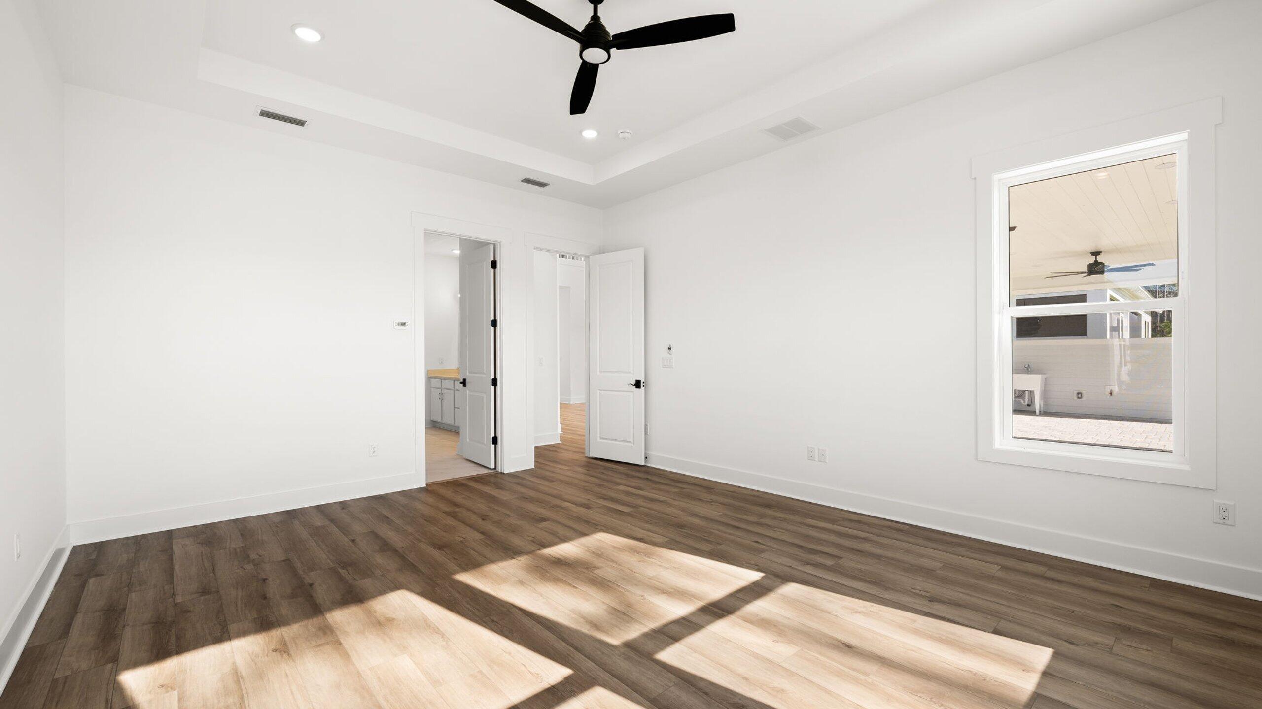 33 Dunns Cir Inlet Beach Inlet Beach, FL 32461 - Photo 12 of 82 a view of a livingroom with wooden floor and a ceiling fan