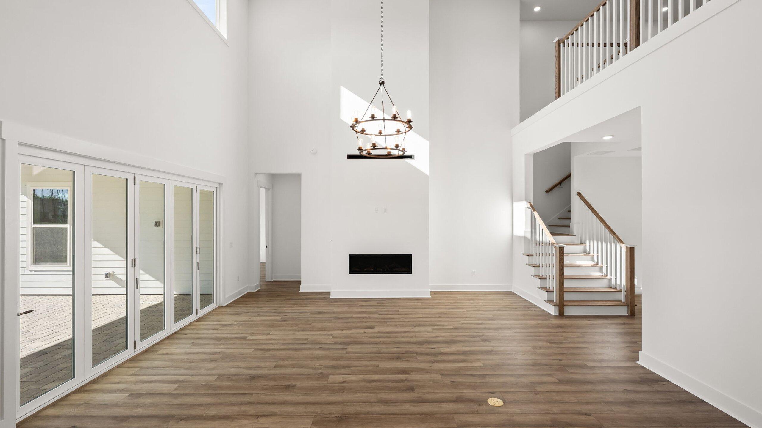 33 Dunns Cir Inlet Beach Inlet Beach, FL 32461 - Photo 17 of 82 a view of a livingroom with wooden floor and stairs