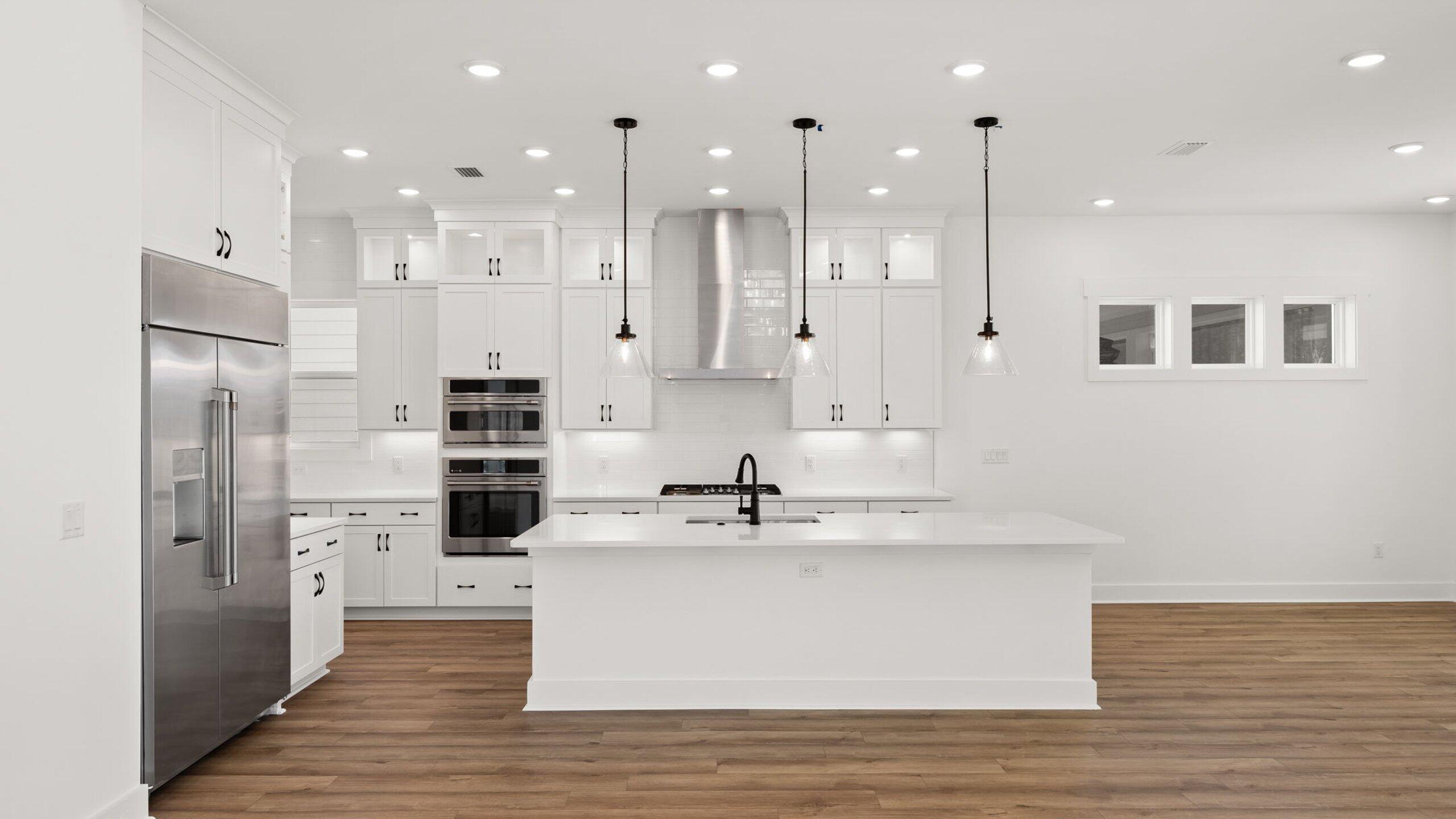 33 Dunns Cir Inlet Beach Inlet Beach, FL 32461 - Photo 2 of 82 a view of a kitchen with kitchen island stainless steel appliances sink and refrigerator