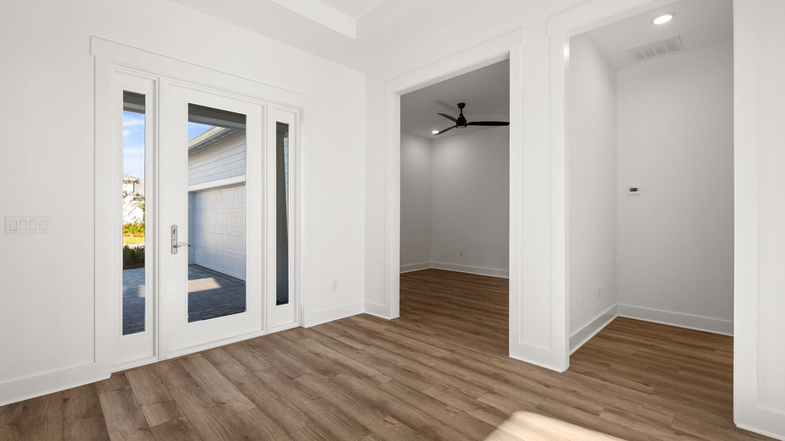 33 Dunns Cir Inlet Beach Inlet Beach, FL 32461 - Photo 26 of 82 a view of a hallway with wooden floor and a bathroom