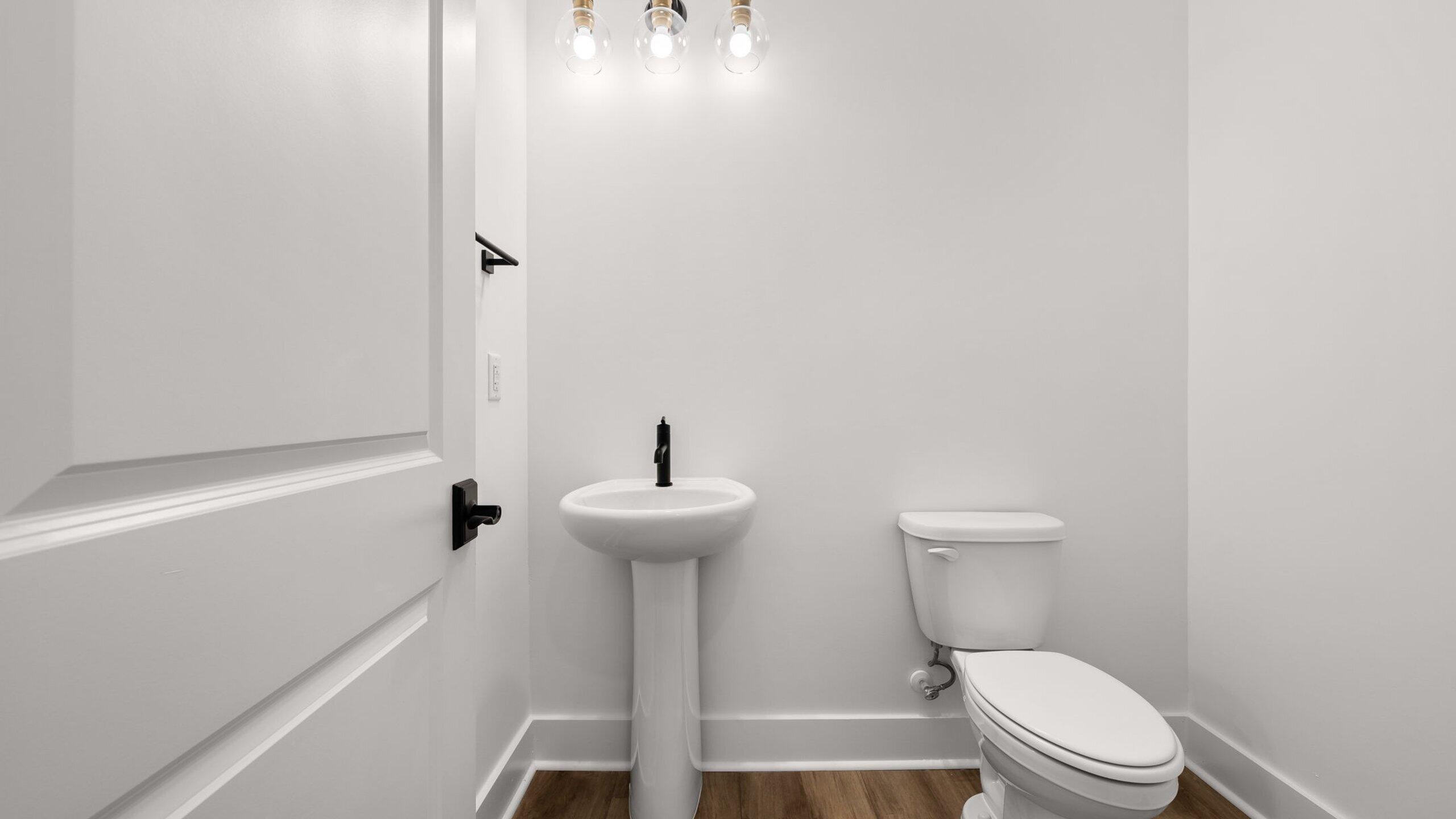 33 Dunns Cir Inlet Beach Inlet Beach, FL 32461 - Photo 27 of 82 a white toilet sitting next to a bath tub