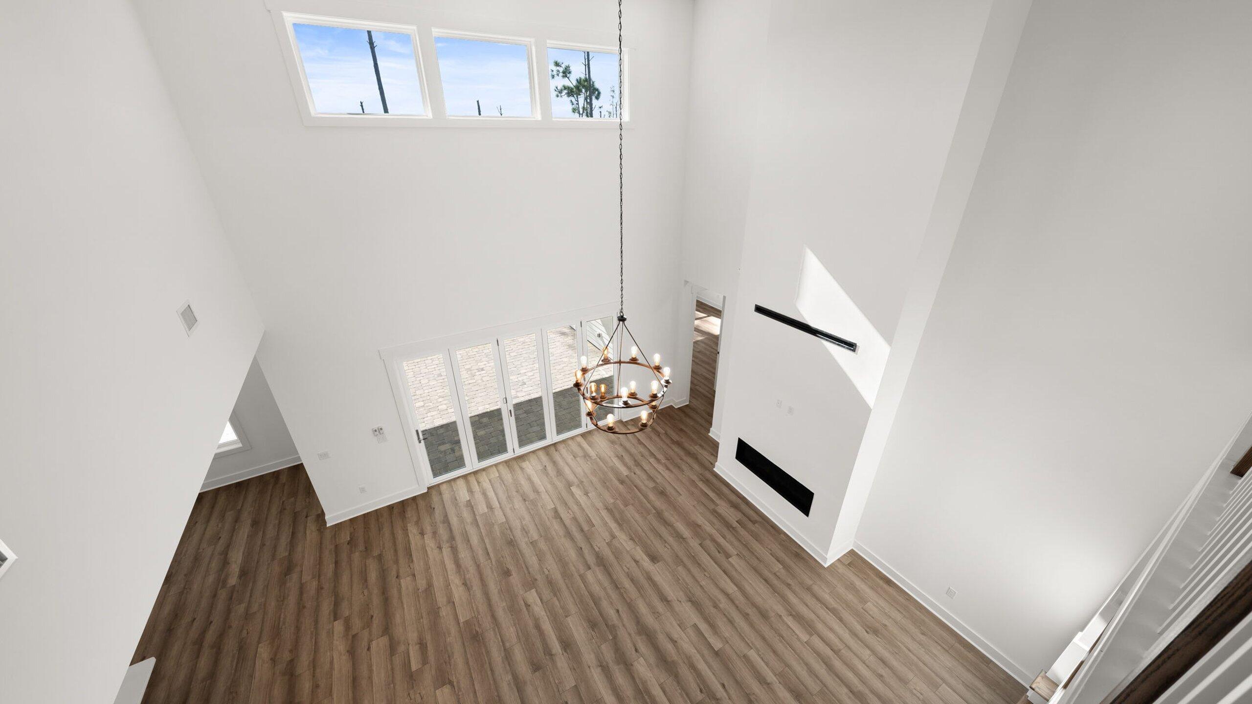 33 Dunns Cir Inlet Beach Inlet Beach, FL 32461 - Photo 34 of 82 a view of an empty room with wooden floor and a window