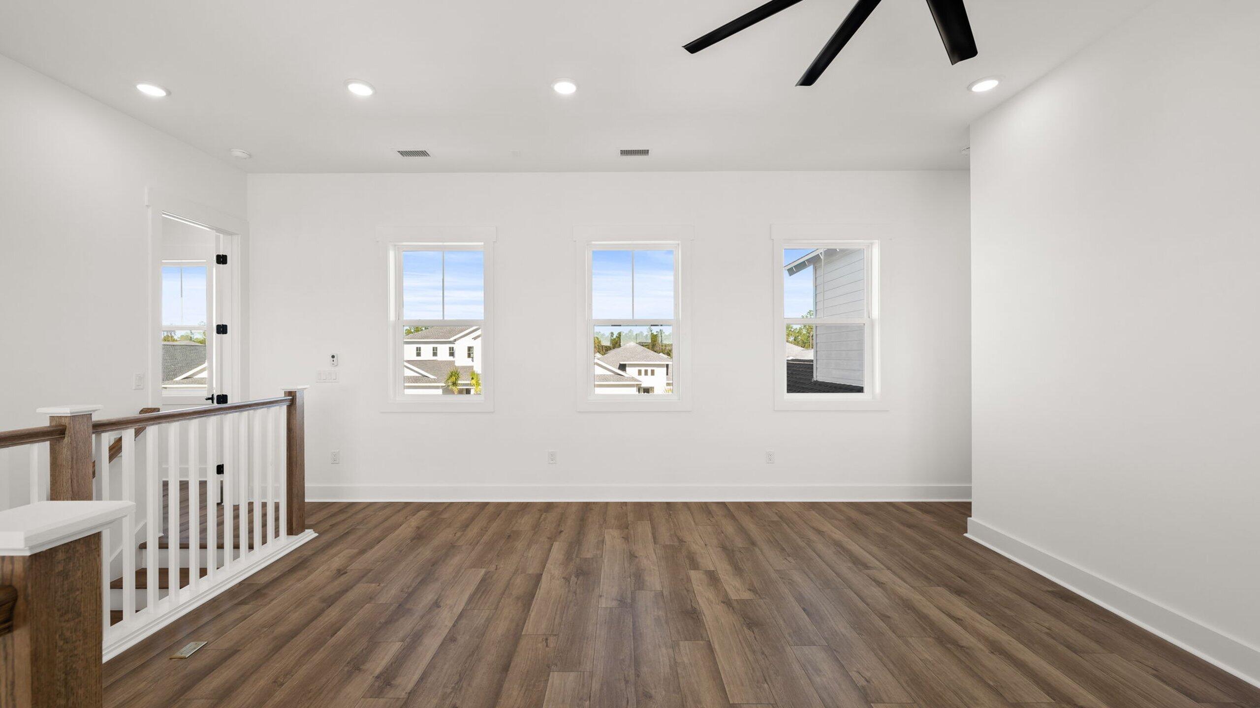 33 Dunns Cir Inlet Beach Inlet Beach, FL 32461 - Photo 35 of 82 wooden floor in an empty room with a window