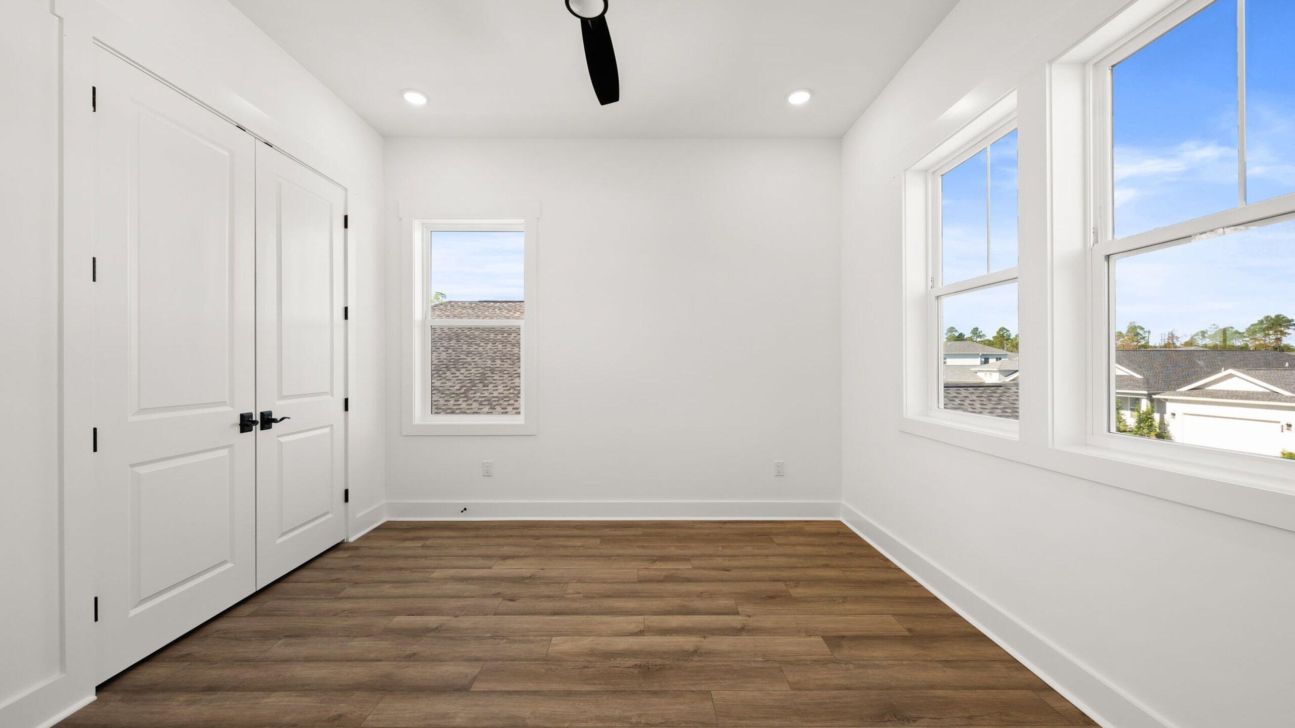 33 Dunns Cir Inlet Beach Inlet Beach, FL 32461 - Photo 37 of 82 a view of an empty room with wooden floor and a window